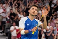 | Photo: PTI/Ravi Choudhary : Lakshya Sen acknowledges fans after his men's singles bronze medal badminton match